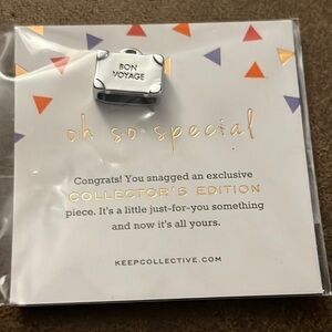 KEEP Collective Bon Voyage silver collector’s edition suitcase slide NWT
